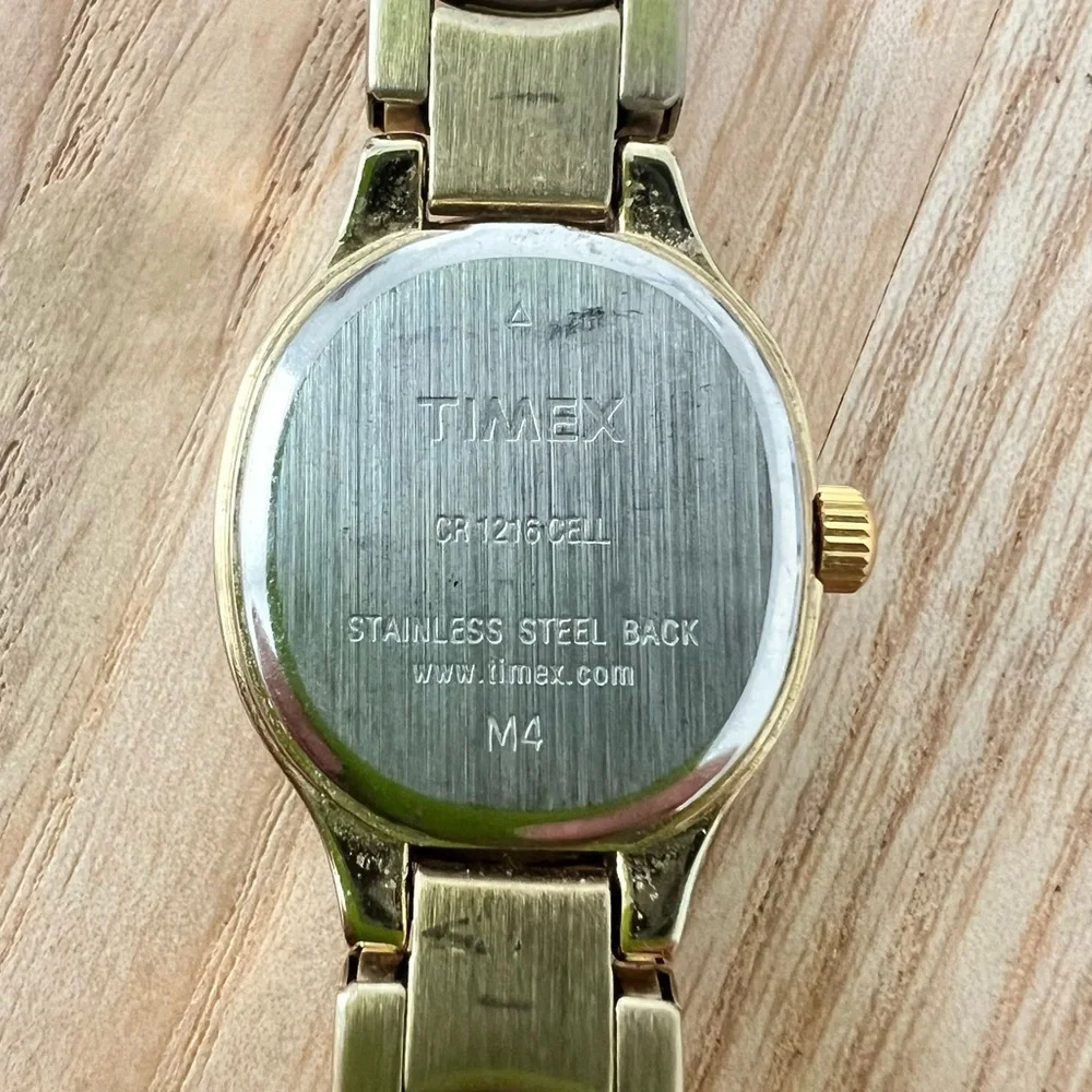 Timex ladies oval gold tone dress watch NEW BATTERY